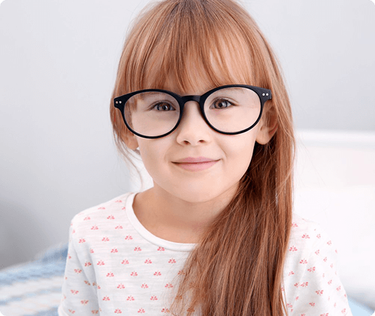 Girl smiling wearing glasses